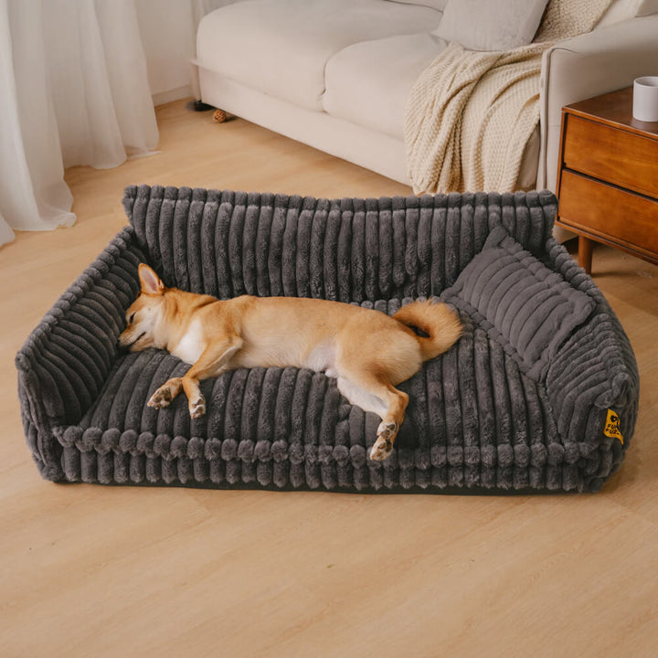 "Orthopädisches waschbares Hundebett aus Kunstfell mit Kissen und Armlehnen, ideal für Gelenkunterstützung, grau."