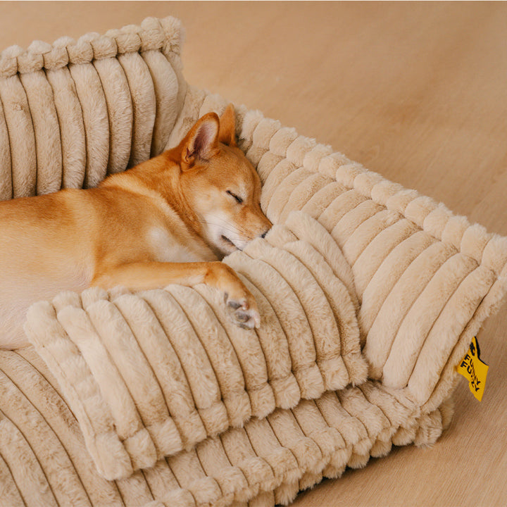 "Orthopädisches waschbares Hundebett aus Kunstfell mit Kissen und Armlehnen, ideal für Gelenkunterstützung, grau."