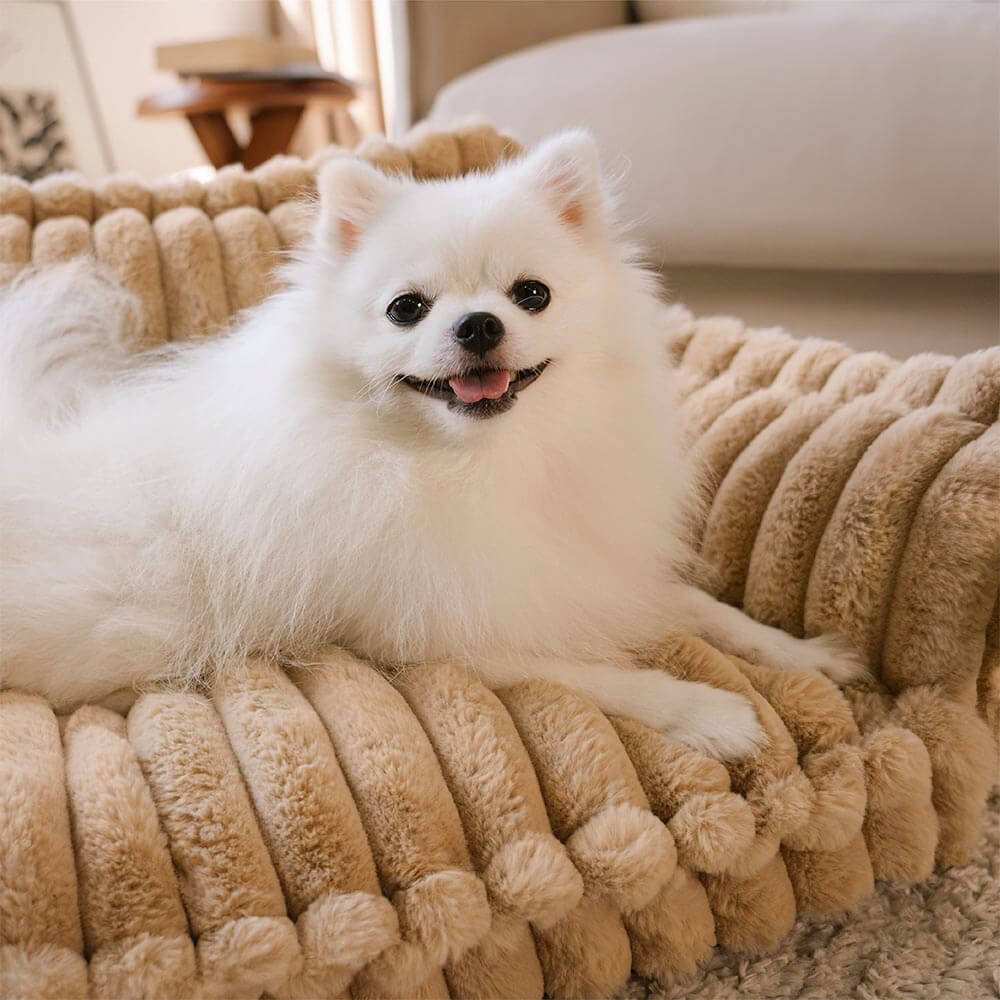 "Orthopädisches waschbares Hundebett aus Kunstfell mit Kissen und Armlehnen, ideal für Gelenkunterstützung, grau."
