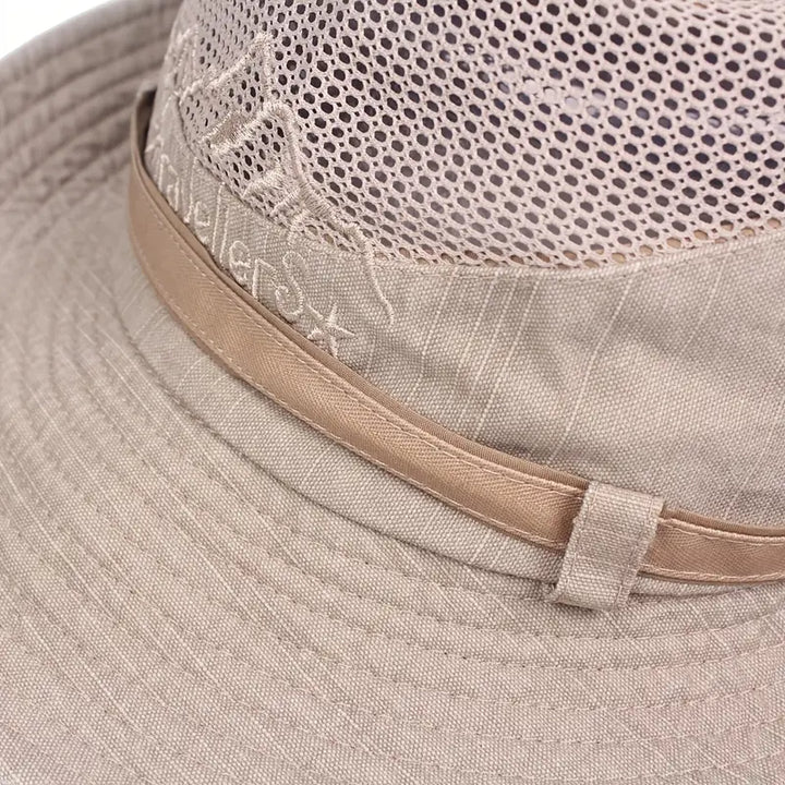 Outdoor Sonnenhut mit breitem Rand, UV-Schutz, verstellbaren Riemen, ideal für Wanderungen und Strandtage.