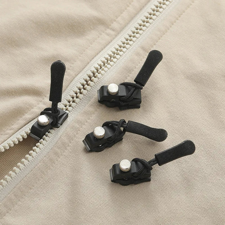"Reißverschluss-Reparatur-Set mit diversen Werkzeugen auf hellem Hintergrund, ideal für Kleidung und Taschenreparatur."