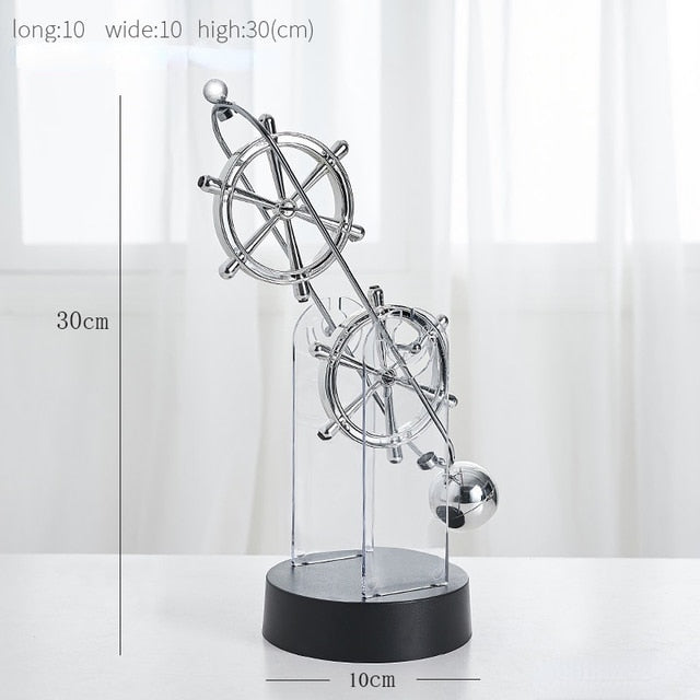 Rotierendes Perpetuum Mobile-Pendel, dekoratives Ornament mit edlem Doppel-Dreifachring-Design, still und hypnotisch.