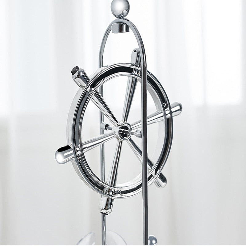 Rotierendes Perpetuum Mobile-Pendel, dekoratives Ornament mit edlem Doppel-Dreifachring-Design, still und hypnotisch.