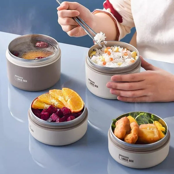 "Runde, mehrschichtige ThermoBox Lunchbox, stapelbar, mit Deckel in stilvollem Design, ideal für unterwegs"