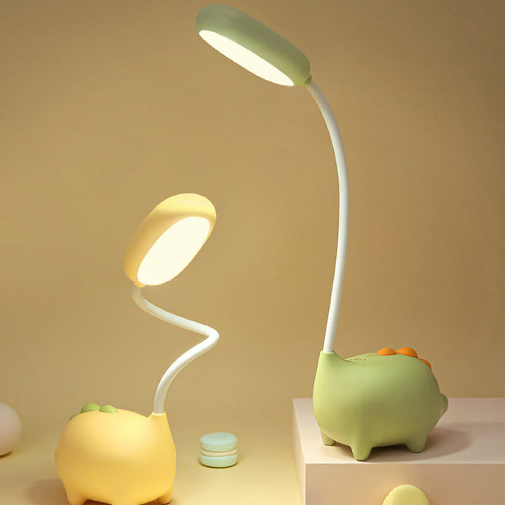 Sandsberg LED-Schreibtischlampe in Dinosaurier-Form, augenfreundlich, wiederaufladbar, ideal für Kinderzimmer.