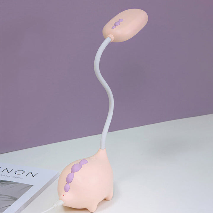 Sandsberg LED-Schreibtischlampe in Dinosaurier-Form, augenfreundlich, wiederaufladbar, ideal für Kinderzimmer.