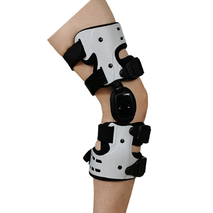 "Schwarze verstellbare Kniebandage seitlich für Druckentlastung, Stabilität und Komfort bei Arthrose und Bänderverletzungen."
