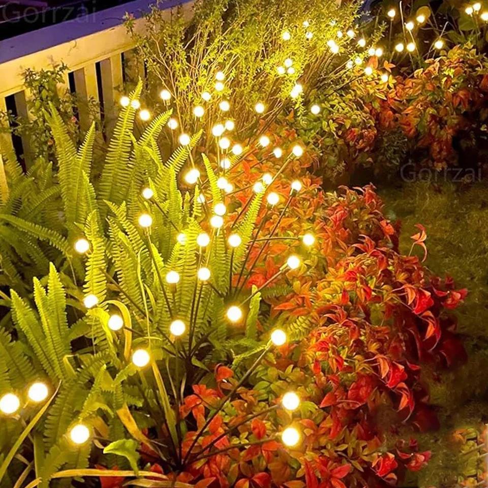 Solar-Glühwürmchen-Gartenlichter leuchten in warmem Licht, energieeffizient & wetterfest, verwandeln Garten in Lichtoase.