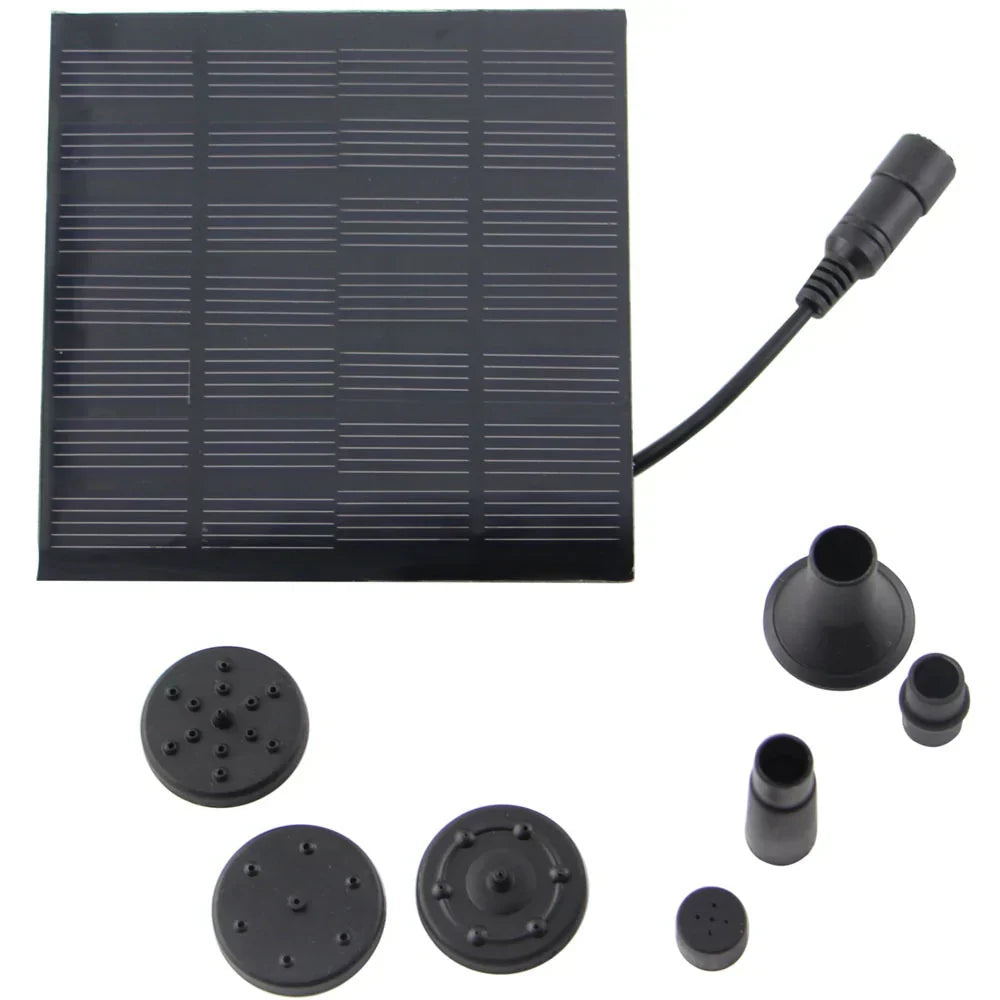 Solarbetriebener Wasserbrunnen im Garten mit verschiedenen Sprühköpfen, solarbetrieben, ideal für Teiche und Vogelbäder.