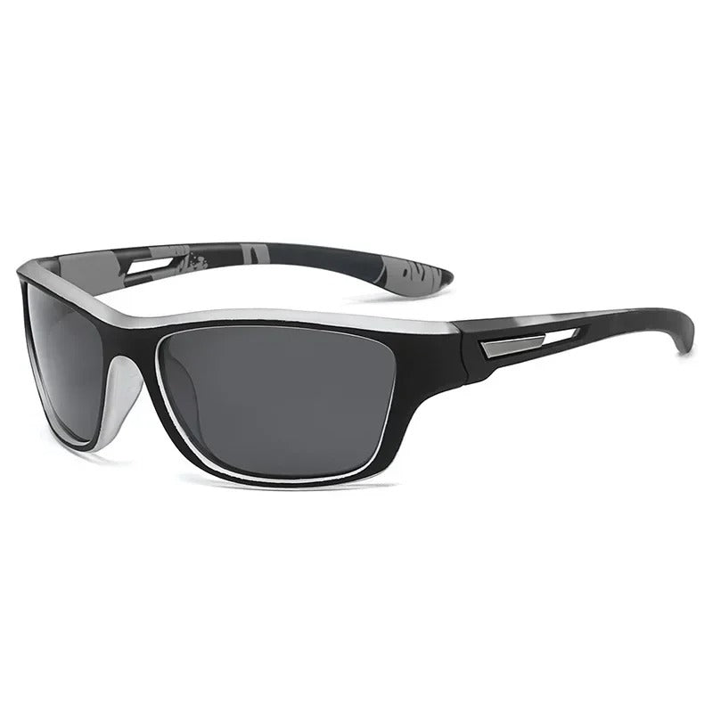 "Sportliche Sonnenbrille mit polarisierten Linsen und UV400 Schutz, ideal für Sport und Freizeit. Kunststoffrahmen in klassis