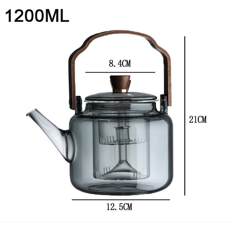 "Stilvolle Teekanne aus Glas und Holz mit elegantem Design und ergonomischem Griff, ideal für Teezeremonien."