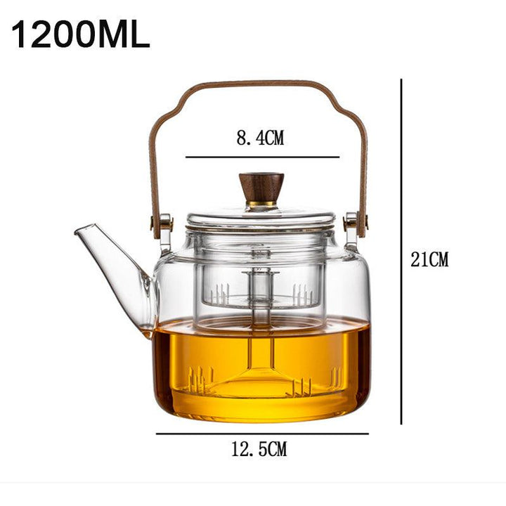 "Stilvolle Teekanne aus Glas und Holz mit elegantem Design und ergonomischem Griff, ideal für Teezeremonien."