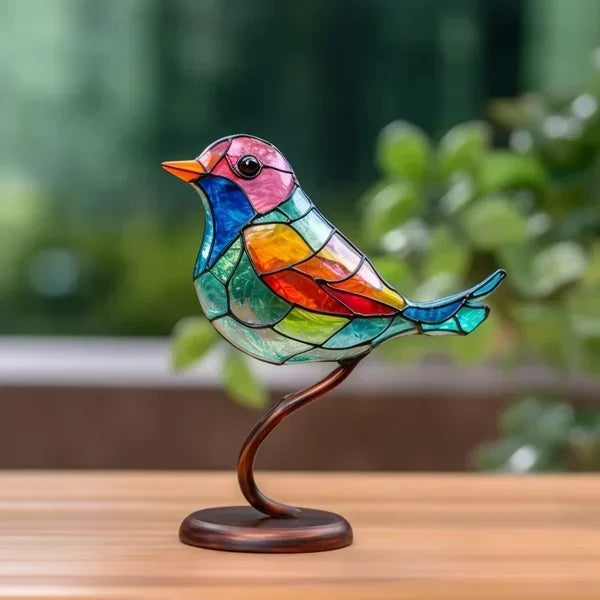 "Stilvolle VitraGlow Tischlampe aus gefärbtem Glas, kunstvolles Design, verbreitet warmes, einladendes Licht im Raum."