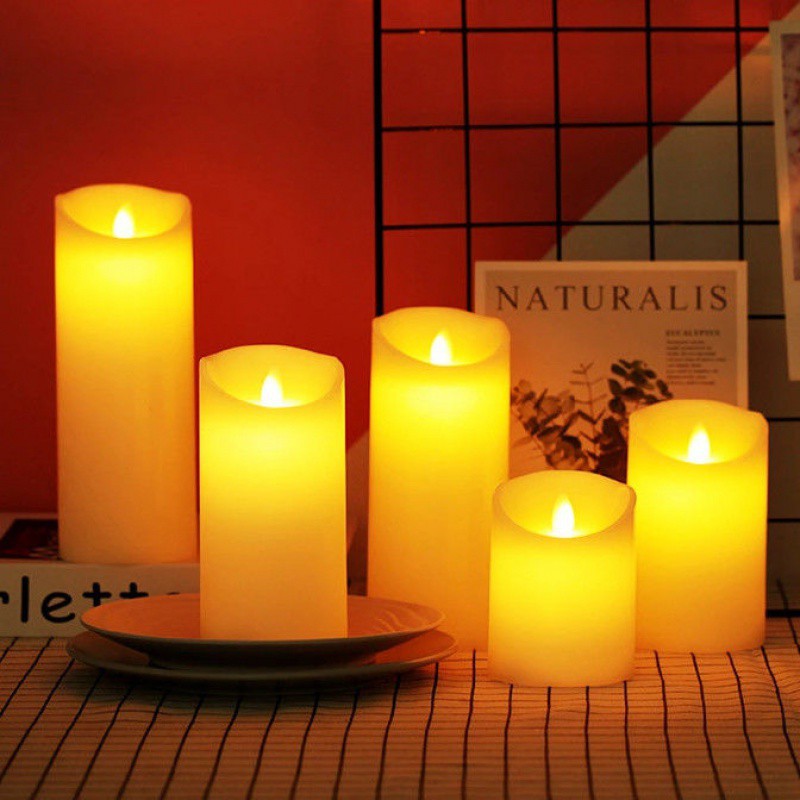 "Stimmungsvolle LED-Kerzen mit realistischem Flammeneffekt in Kürbisform, Holzoptik und klassischem Design, warmweißer Schein