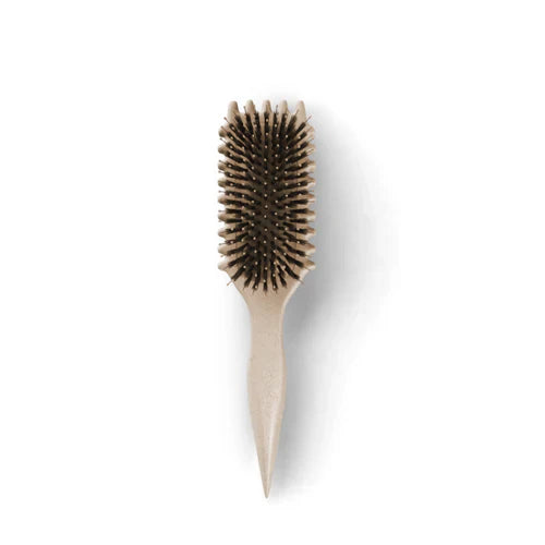 "Stylingbürste für Locken, hellgrün, ideal zur Frizz-Kontrolle und für definierte Strähnen, ergonomisch, Beauty-Produkt."