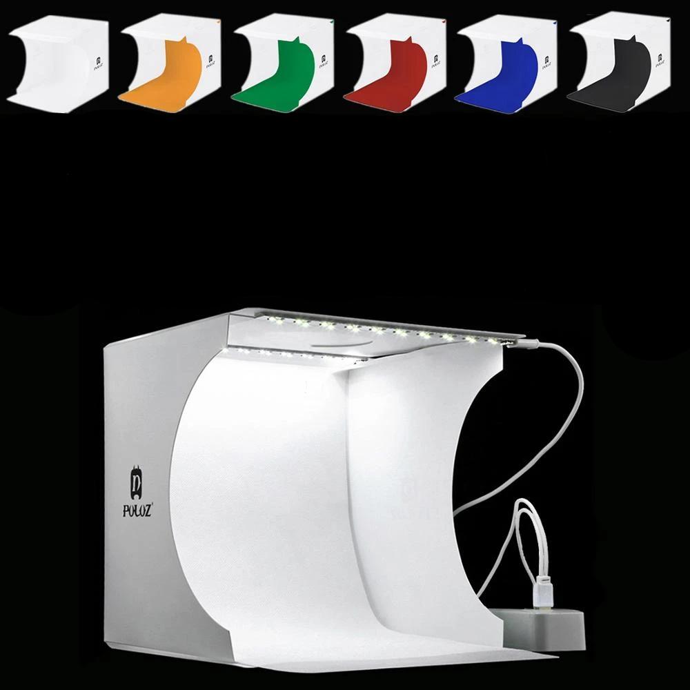 Tragbares LED-Fotostudio mit heller Beleuchtung, ideal für hochwertige Produktfotografie wie Schmuck und Gadgets.