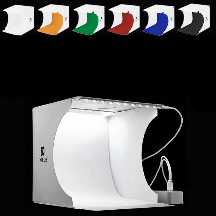 Tragbares LED-Fotostudio mit heller Beleuchtung, ideal für hochwertige Produktfotografie wie Schmuck und Gadgets.