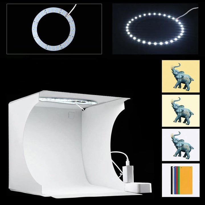 Tragbares LED-Fotostudio mit heller Beleuchtung, ideal für hochwertige Produktfotografie wie Schmuck und Gadgets.