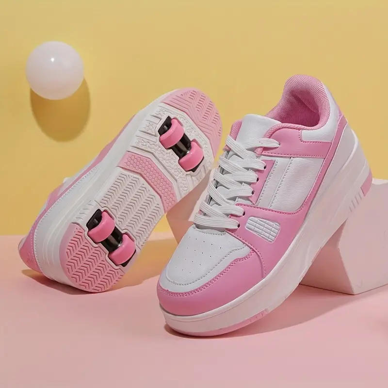 "Trendige Rollschuhe für Kinder mit versteckten Rollen, rosa-schwarzes Design, ideal für Outdoor-Abenteuer und Bewegung"