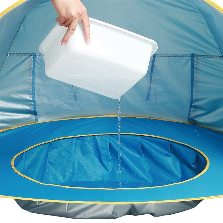 "UV-Schutz-Strandzelt mit integriertem Baby-Planschbecken, blaues Zelt, bietet Sonnenschutz und sicheren Spielspaß"
