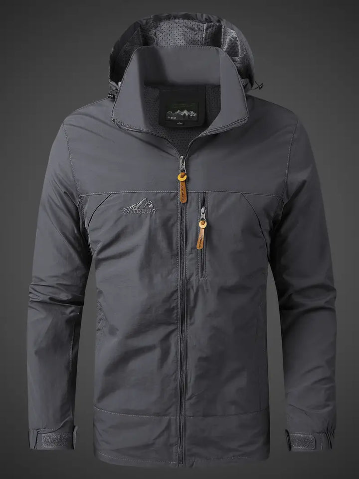 "Wasser- und winddichte Herren Outdoorjacke für alle Jahreszeiten, robust und stilvoll, ideal für Camping und Wandern"