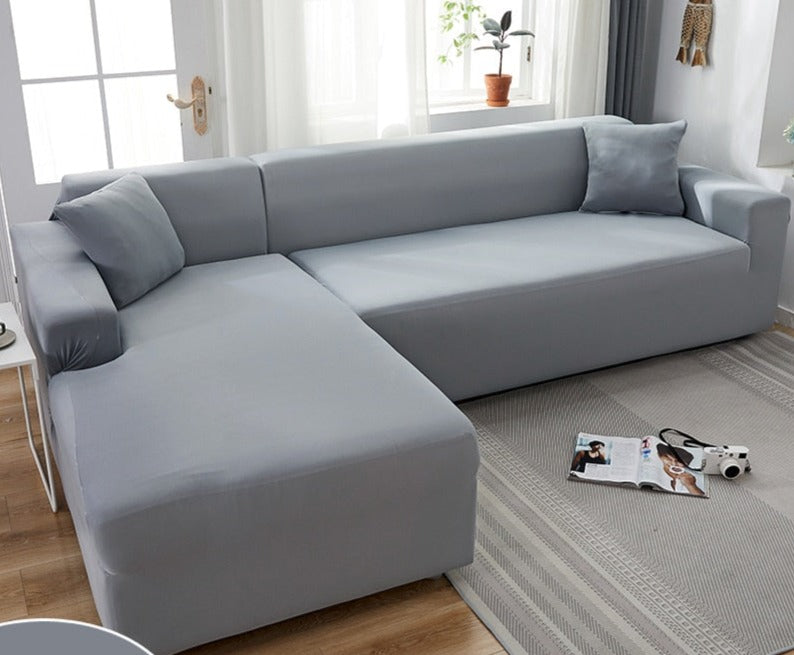 "Wasserdichte dehnbare Bankauflage in Grau, passt nahtlos, schützt vor Schmutz und Feuchtigkeit, ideal für Sofas."