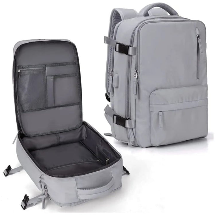 "Wasserdichter Damenreise-Rucksack mit USB-Anschluss, 35L Volumen, in Blau mit gepolsterten Gurten und Sicherheitsfach."