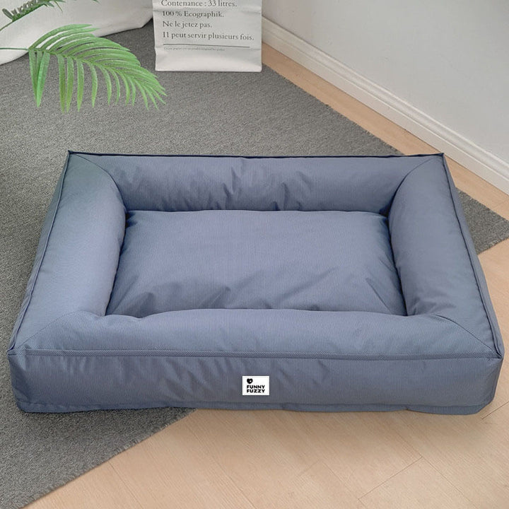 Wasserfestes Hundebett, orthopädisch, großes Modell, graues Material, mit erhöhter Kante für komfortable Kopfstütze