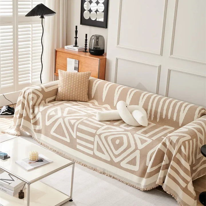 Weiche Chenille Sofadecke mit Quasten, luxuriöses Boho-Design in Beige, ideal für gemütliche Abende und stilvolle Deko.